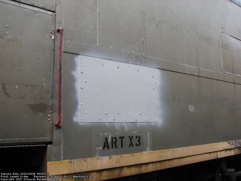 Patch in place on repair of Exhibit Car exterior