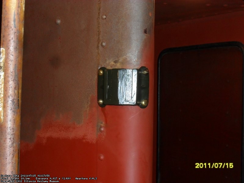 AFTER DRILLING AND TAPING HOLES, THE BRACKET IS INSTALLED JULY 15,2011