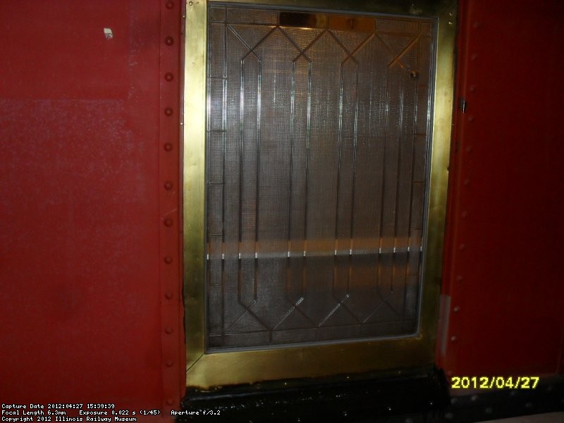 exterior side of installed brass window frame 4-20-12