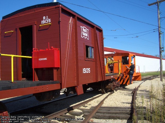 09.12.07 - HENRY VINCENT, ENGINEER, AND WES LLOYD, SWITCHMAN, USE THE JOY 2 ENGINE TO PULL THE CABOOSE TO WHERE THE COM ED 4 ELECTRIC ENGINE COULD TAKE OVER PULLING THE CABOOSE FOR TESTING OF ITS BRAKES AND JOURNAL BOXES ON THE MAIN LINE, AFTER ALL JOURNAL BOXES WERE REPACKED.  TRAIN AIR WAS REQUIRED FOR THIS AND THE JOY 5 DOES NOT HAVE IT.