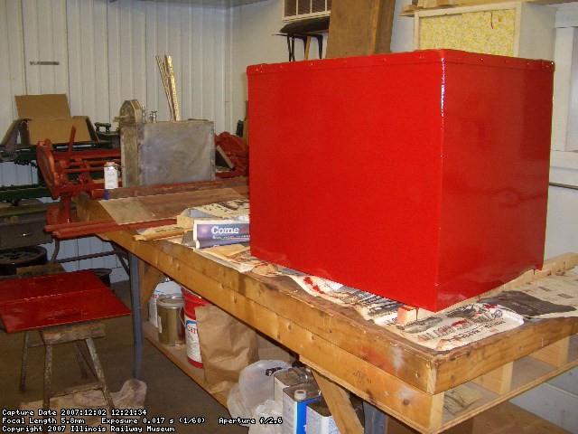 12.02.07 - THE ICE CHEST HAS HAD ITS FIRST COAT OF FINISH PAINT APPLIED.  THE BRAKE ROD HAD ITS FINISH COAT OF PAINT APPLIED.