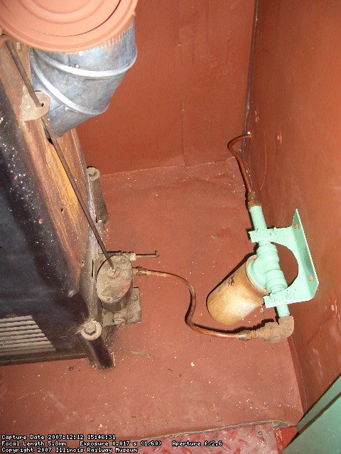 12.12.07 - THE FUEL FILTER AND BRACKET WERE APPLIED, AS WELL AS THE LINES CONNECTING THE FILTER TO THE TANK AND HEATER.  THE ICE BOX DRAIN WAS APPLIED AND THE ICE BOX WAS ANCHORED TO THE FLOOR.