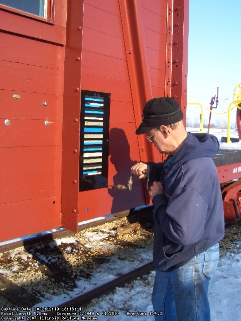 12.19.07 - VICTOR HUMPHREYS IS INSTALLING THE ACI LABELS WHICH WERE ON THE CAR PRIOR TO ITS ARRIVAL AT THE MUSEUM.  THESE LABELS WERE APPLIED IN THE 1960'S AND 1970'S FOR OPTICAL SCANNING TO LOCATE CARS. THE SYSTEM HAD POOR READABILITY RESULTS AND WAS ABANDONED FOR AEI TAGS, WHICH ARE EXTREMELY ACCURATE.
