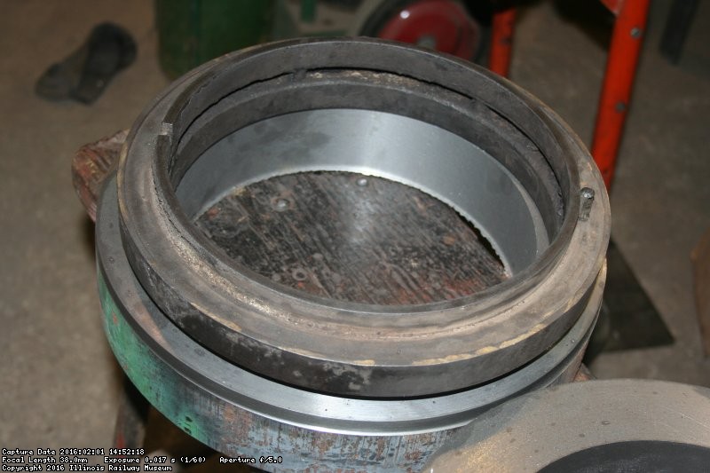Old bull ring sits on top of the cast iron blank from which a replacement will be machined