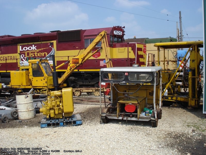 Multiple MOW equipment in view with three locomotives tied down in yard 2