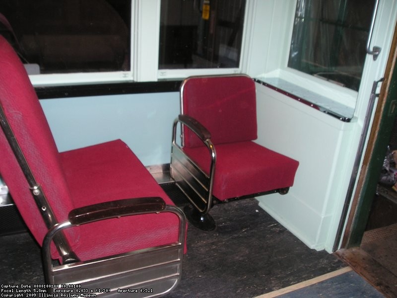 Nov 02, 2003, the first two reupholstered seats are installed in the coach section.