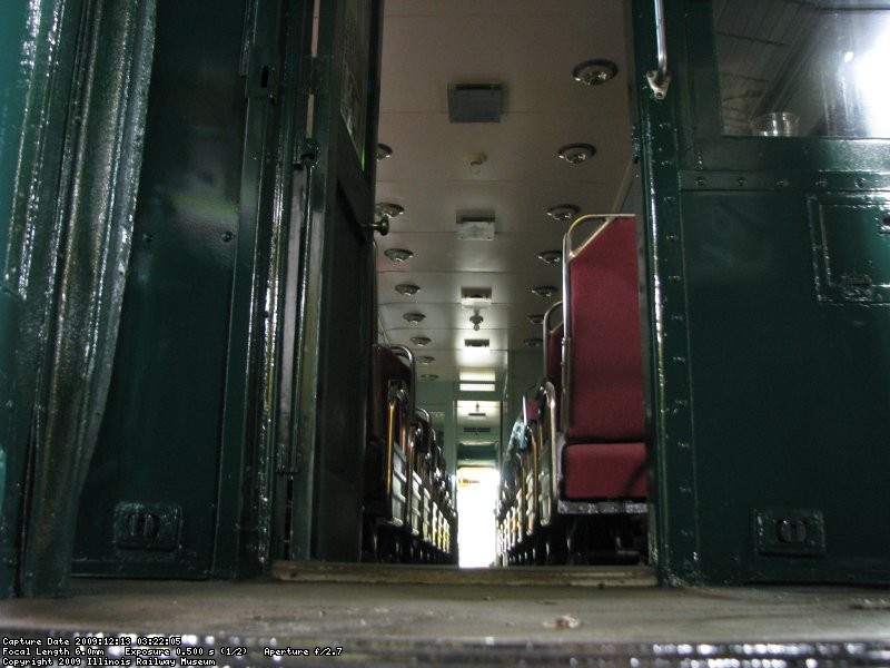 A view through the #2 end of 749, showing the freshly painted vestibule as well as restored interior.