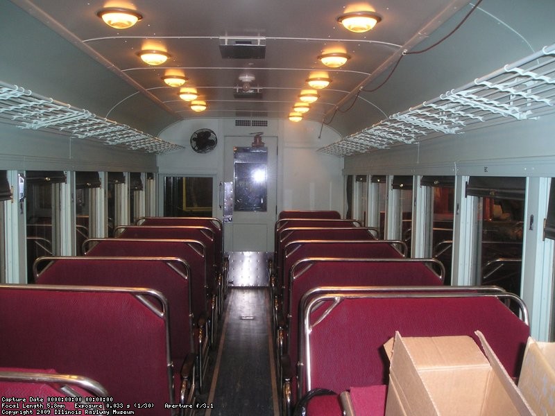 An older interior photo shows the new paint, new upholstery, and new decals on the wall.