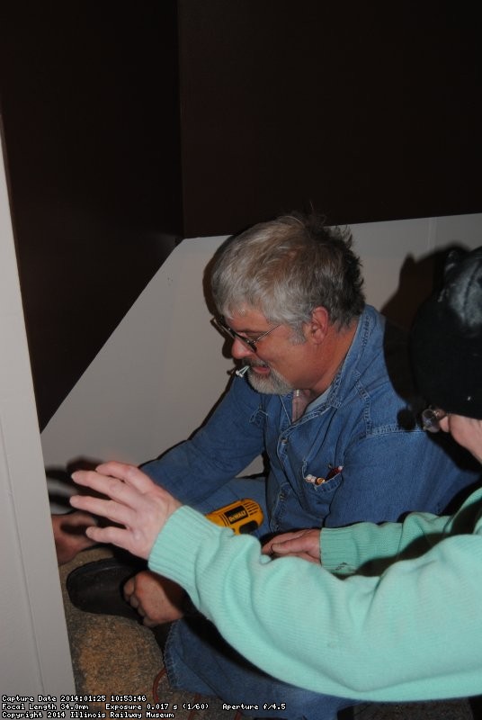 Mike and Shelly apply a vent cover to the new opening