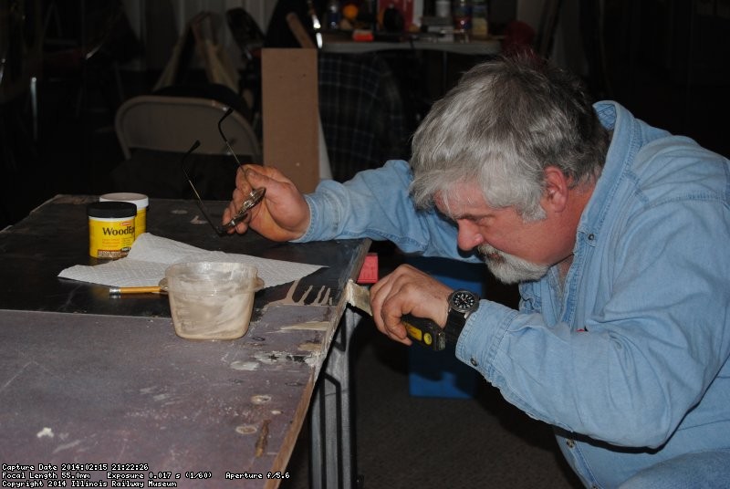 Mike Baksic applying epoxy to the vestibule closet door 2/16/14