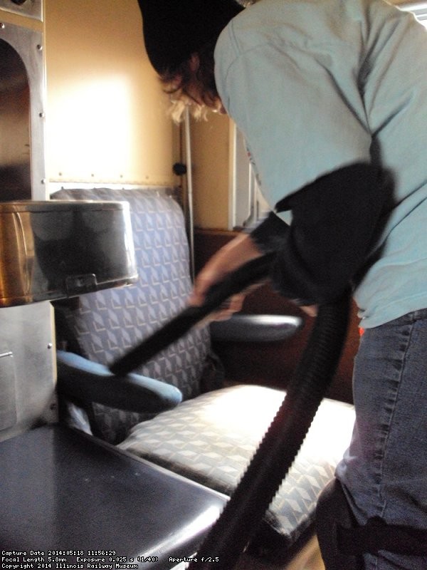 Shelly vacuuming a roomette in the Loch Sloy - Photo by Pauline Trabert
