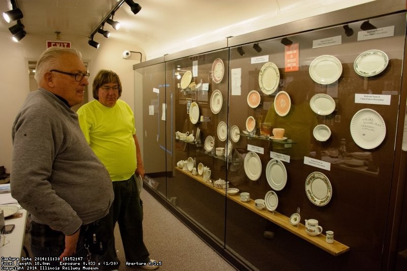 Jim Windmeier and Mark Gellman pondering the dining car china display in the 1st Exhibit Car - Photo by Jon Habegger