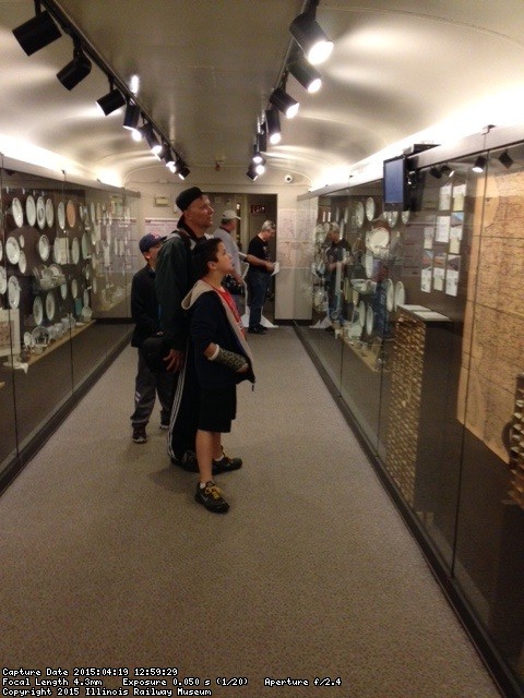 Visitors investigate the new railroad china display - Photo by Michael McCrarren
