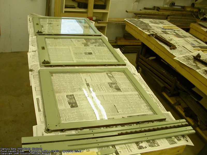 Newly repainted window sash for car 308 on the bench in the wood shop 20 November 2004