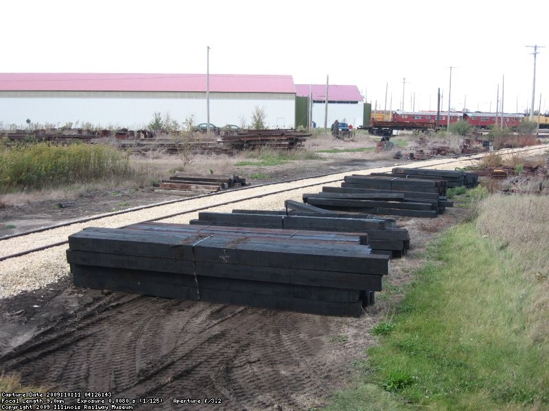 Switch timbers stacked near the connector track.