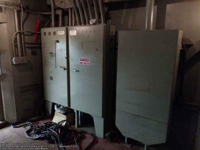 The left cabinet is for the loco battery switch and other 64V wiring. The middle cabinet is an HEP pass-through cabinet where the HEP cables splice together. The right box is a sand tank on the left rear of the loco.