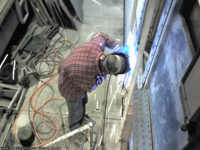 Jamie welding new steel on CNW 411