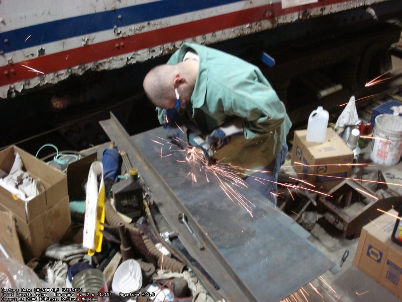 Dan cutting out pieces of steel, soon to be stack covers for METX 308