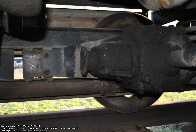 Front differential. Missing drive shaft runs here to the rear axle. It can be a four wheel drive machine