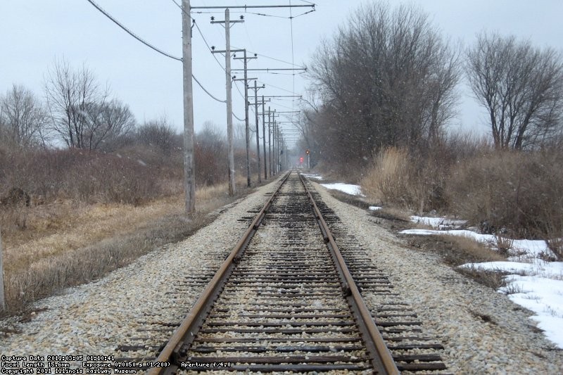 Mainline looking east toward Four Mile Siding.  The beginning of spring inspections and the snow still falls. 3-5-11