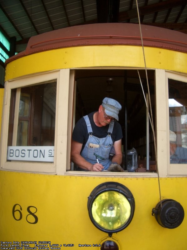 09.19.09 - WES IS COMPLETING A CAR CARD ON THE SS68 PRIOR TO ITS APPEARANCE ON THE TROLLEY LOOP.
