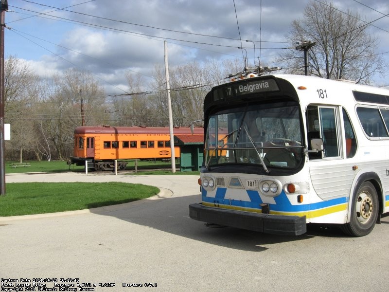 Edmonton BBC 181 sits in front of the Andersen Garage as IT 518 occupies the carline 04/23/2011.