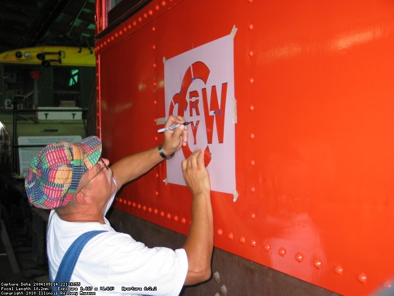 New logo being stenciled to cab