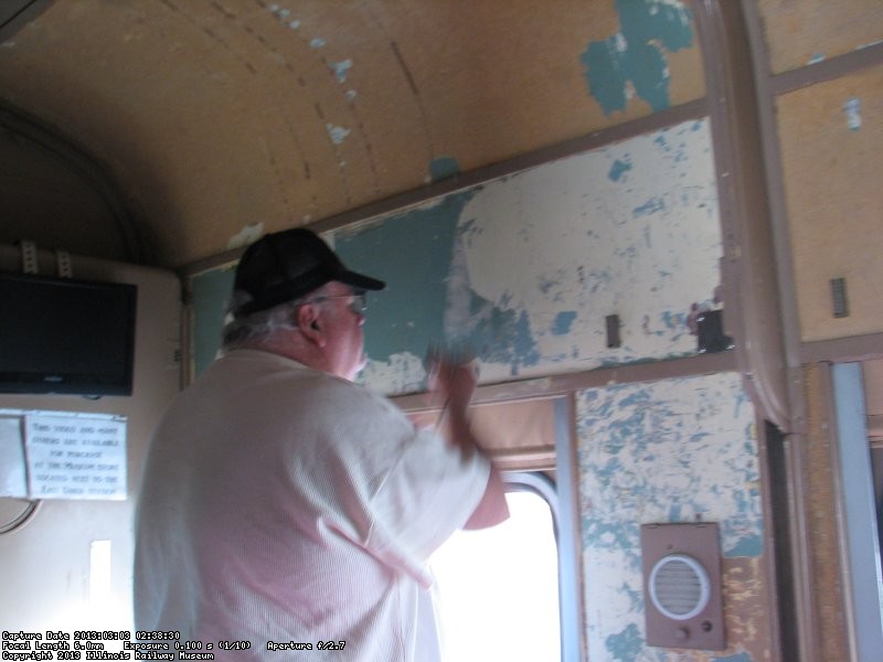 Mike peeling paint from the walls in Pacific Peak March 3, 2013.