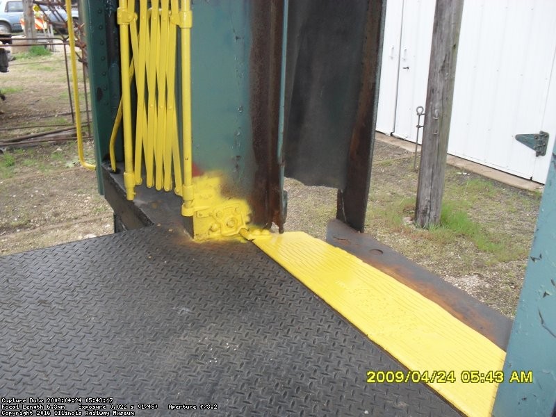 newly installed gate with bright yellow paint 4-24-2009