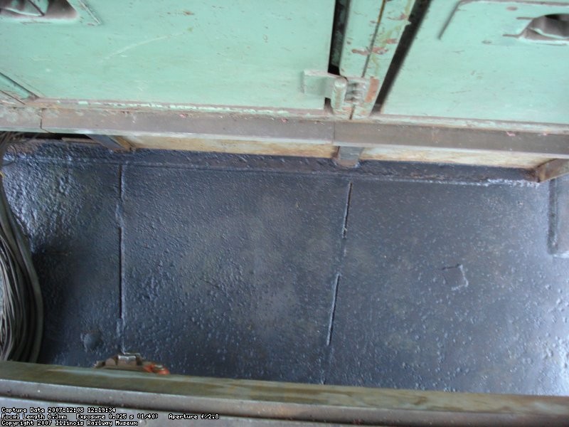 The sub floor under the cab was needle chipped out and rust converter applied