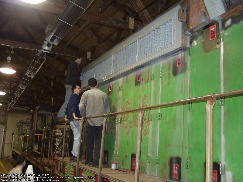 Jamie, Kyle, Roger and Warren installing the engineers side shutters.