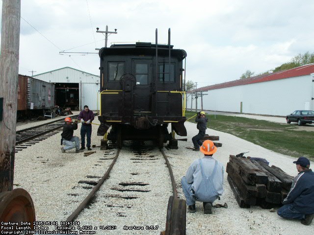 05.01.05 -  THE CAR IS BEING JACKED UP BY THE TRACK DEPARTMENT MEMBERS TO CHANGE A DAMAGED PAIR OF WHEELS.