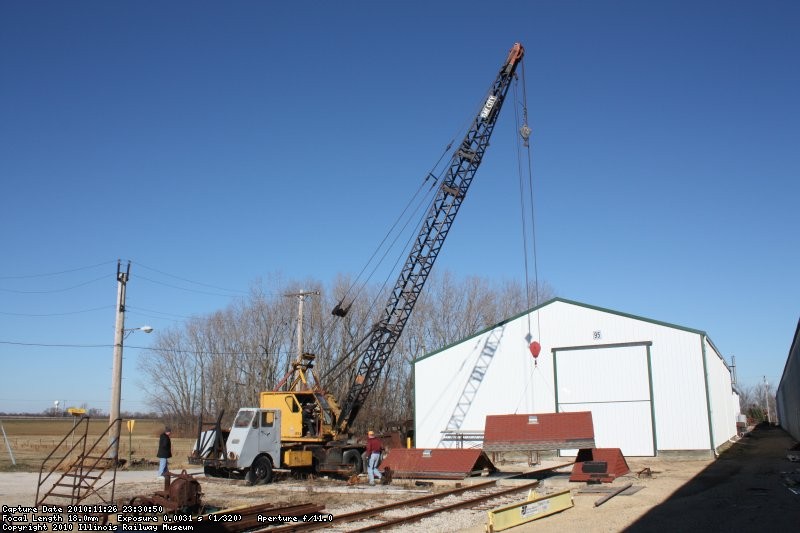 November 26th, the Bay City crane moves the roof off of the drop table.