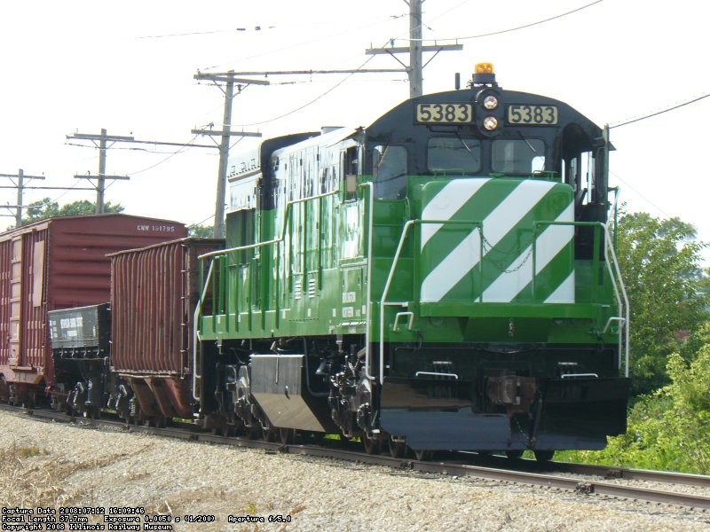 BN 5383 shoving the freight train back to the west end.
