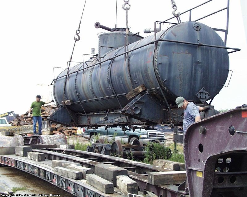 10.17.03 - THE TANK IS BEING LOADED ONTO A TRANSPORT TO MOVE IT FROM LAWRENCEVILLE, ILLINOIS TO WASHINGTON, INDIANA FOR RESTORATION.