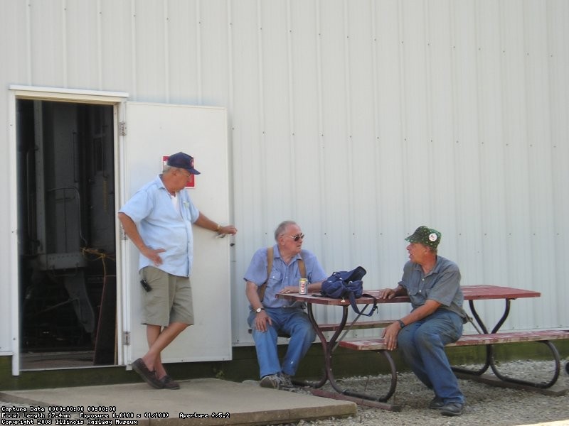 08/11/07 Nick Kallas looks on while Bob Hunter and Bob Kutella discuss primer