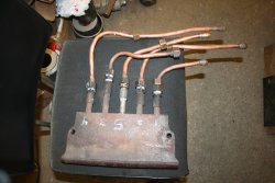 Repaired stoker manifold