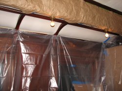 Plastic was hung to protect the dining room walls in the Ely