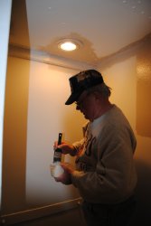Kevin began applying the 1st coat of tan paint to the vestibule