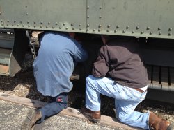 Ray Mormann and Mike Baksic checking the wheels on Lackawanna 561