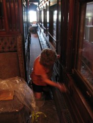Shelly Vanderschaegen buffing wax in the Ely dining room - Photo by Pauline Trabert