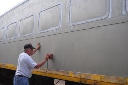 Kevin Kriebs is scuffing the exterior of the 1st Exhibit Car - Photo by Shelly Vanderschaegen