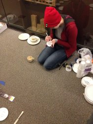 Patrice brought paper plates and cups to make a mock up of the china exhibit - Photo by Michael McCraren