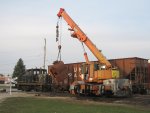 Lowering the 1800's locomotive firebox to the pallet