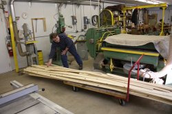 Bill Moran stacks up the completed roof planks - 01/22/2011.