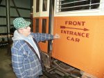 Pete inspects his newly painted sign.