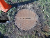 Electric manhole near admission booth.
