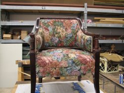 One of two chairs John McKelvey is reupholstering for use in the Lake City.