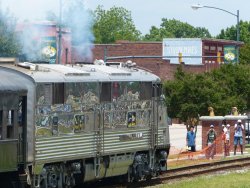 Silver Pilot accelerating away with the North Carolina Transportation Museum's coach train - Photo by Brian LaKemper