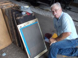 Dan Bixler prepping brass window frame for primer   John Mcloughlin washroom window DSCN0506